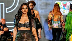 Fatima Ali - mobile phone as wristlet-2 piece skirt set by Carlos Zanetta - Los Angeles Fashion Week 2024 - Photo Credit Capture Photography by Asante - All Rights Reserved